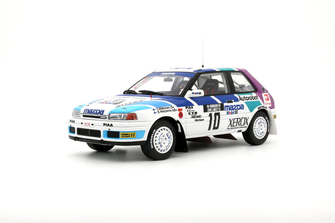 Mazda 323 GTX Gr.A 1000 Lakes Rally 1991 T. Makinen - 1:18