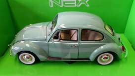 Volkswagen Beetle Green with white wall tires
